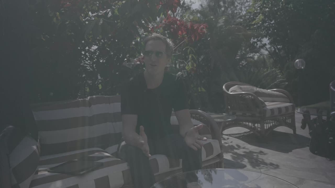 Veranda portrait, golden-hour warmth pulled from flat footage